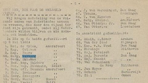 Foto van een krantenbericht met gefusilleerde personen